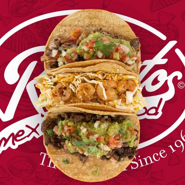 Three Roberto's Mexican Food tacos stacked vertically, featuring carne asada and shrimp fillings.
